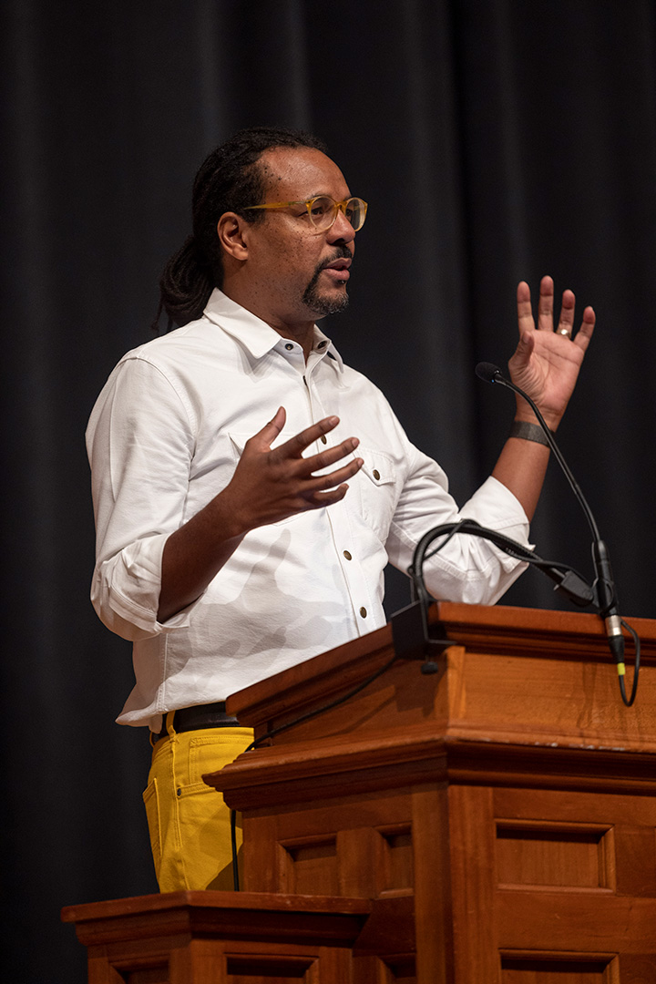 Pulitzer Prize-winning author Colson Whitehead speaking at the podium in the UGA Chapel as he gives the 2023 Phinizy Spalding Lecture. (Peter Frey, University of Georgia Marketing and Communications)